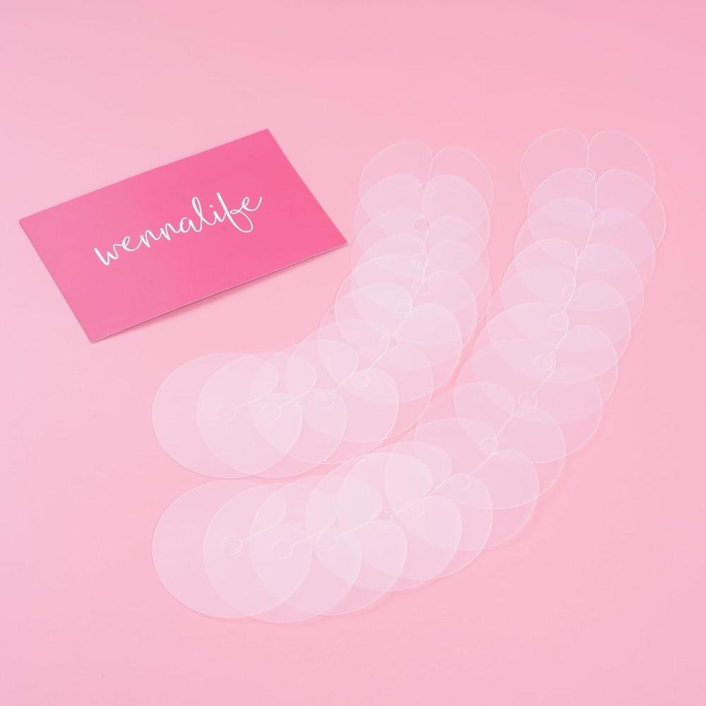 imageWENNALIFE Heat Shield Guards for K Tip Hair Extensions Real Human Hair 25 Pcs Clear PVC Fusion K Tip Tools Single Hole Heat Shield for Hair ExtensionsTransparent